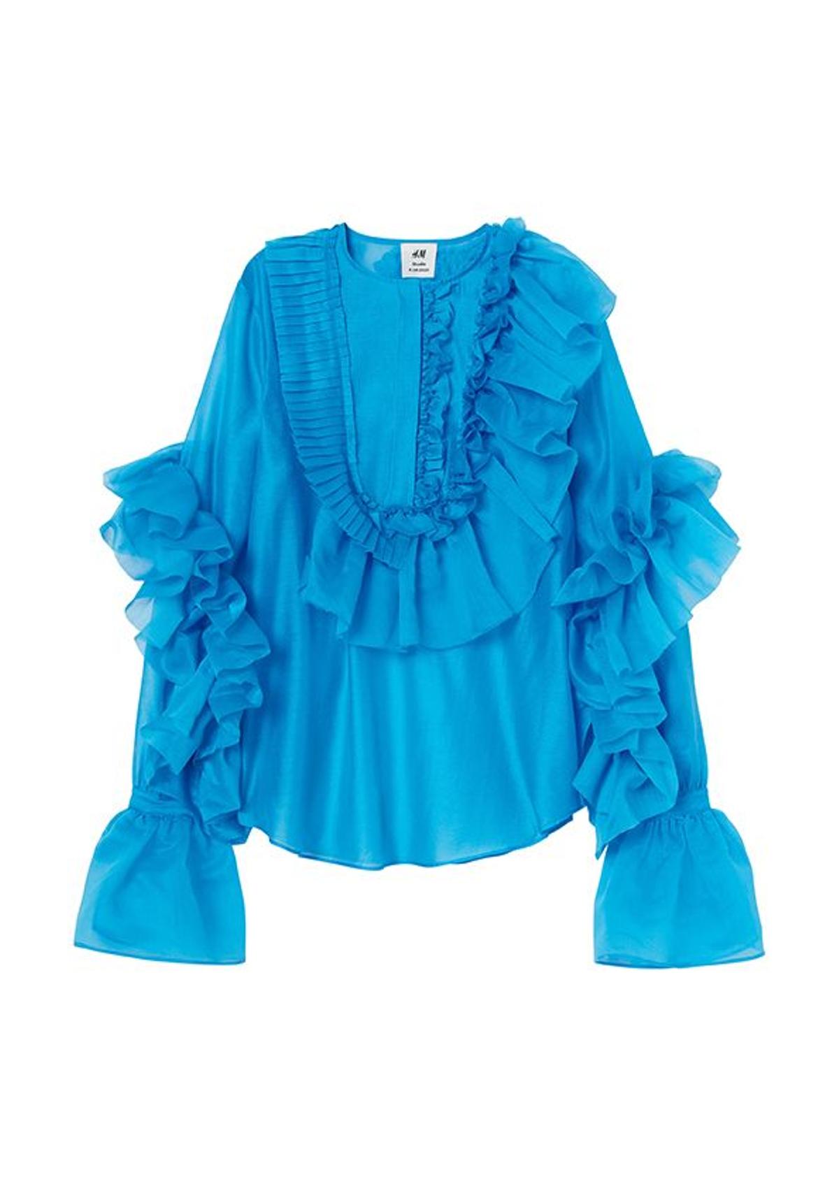 Blusa con volantes, hecho con un 72% de poliéster reciclado, de H&M Studio (79,99 €).