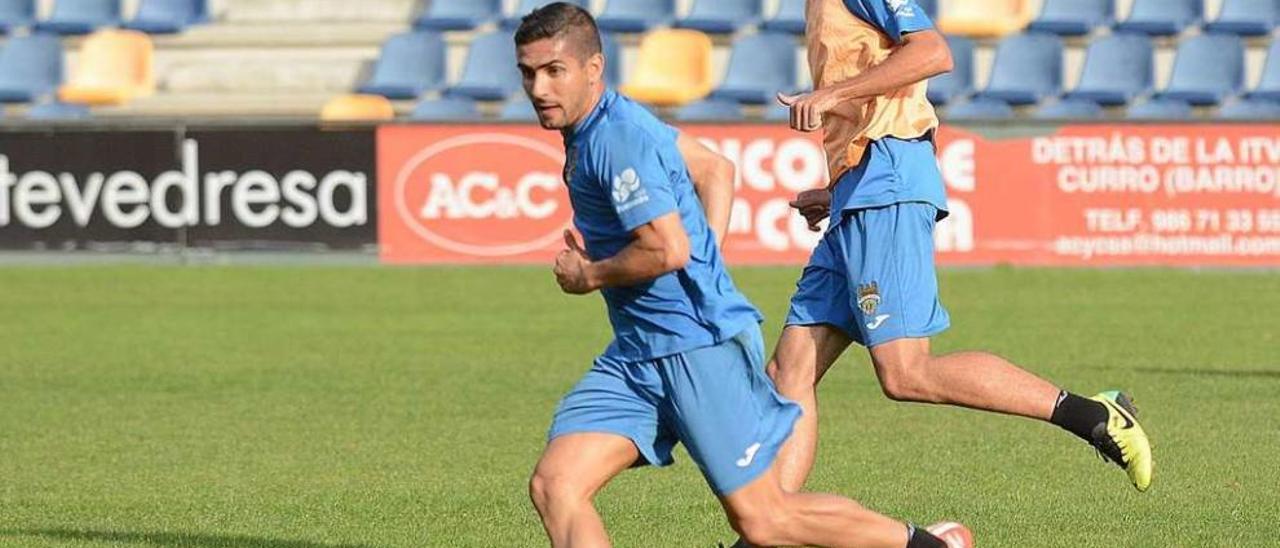 Borjas Martín y Capi, durante un entrenamiento del equipo en el estadio de Pasarón. // Rafa Vázquez