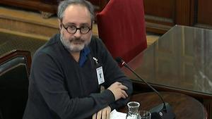 El exdiputado de la CUP Antonio Baños, citado como testigo, antes de abandonar la sala.