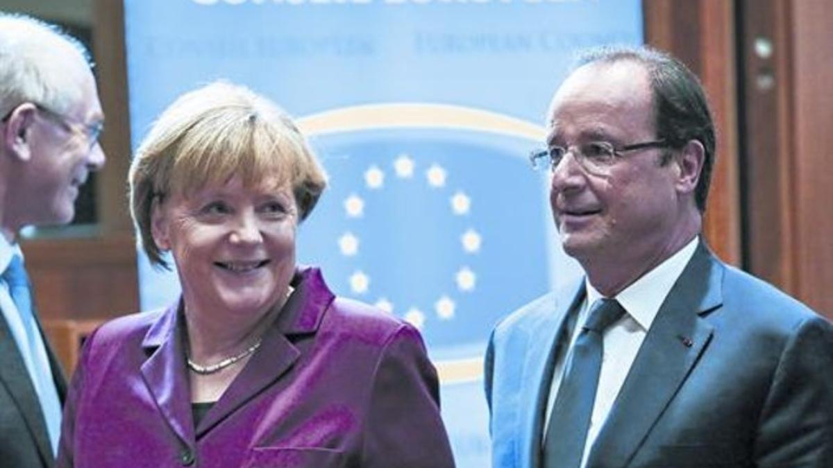 La cancillera Merkel y el presidente de Francia, François Hollande, ayer.
