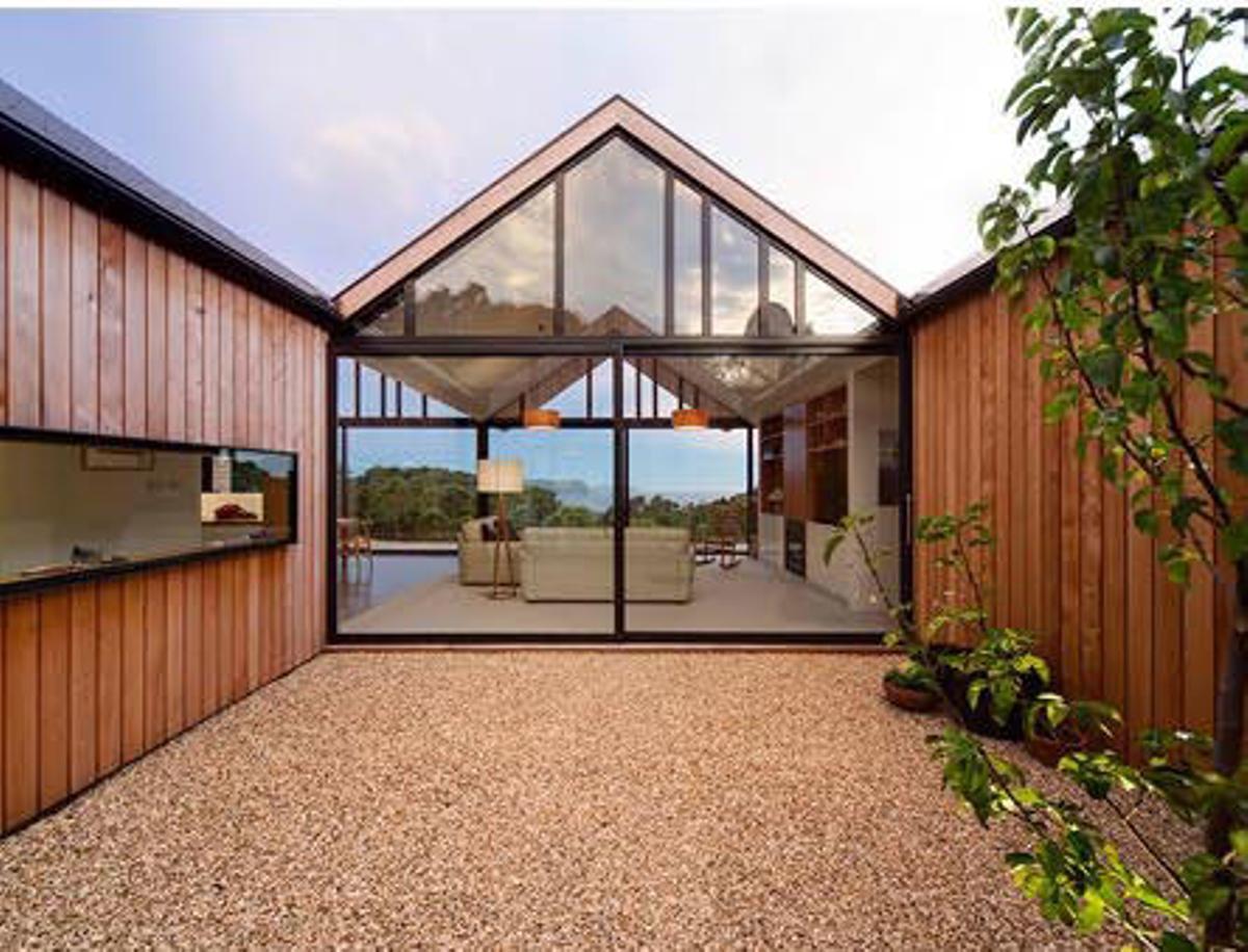 Casas prefabricadas de madera y cristaleras.