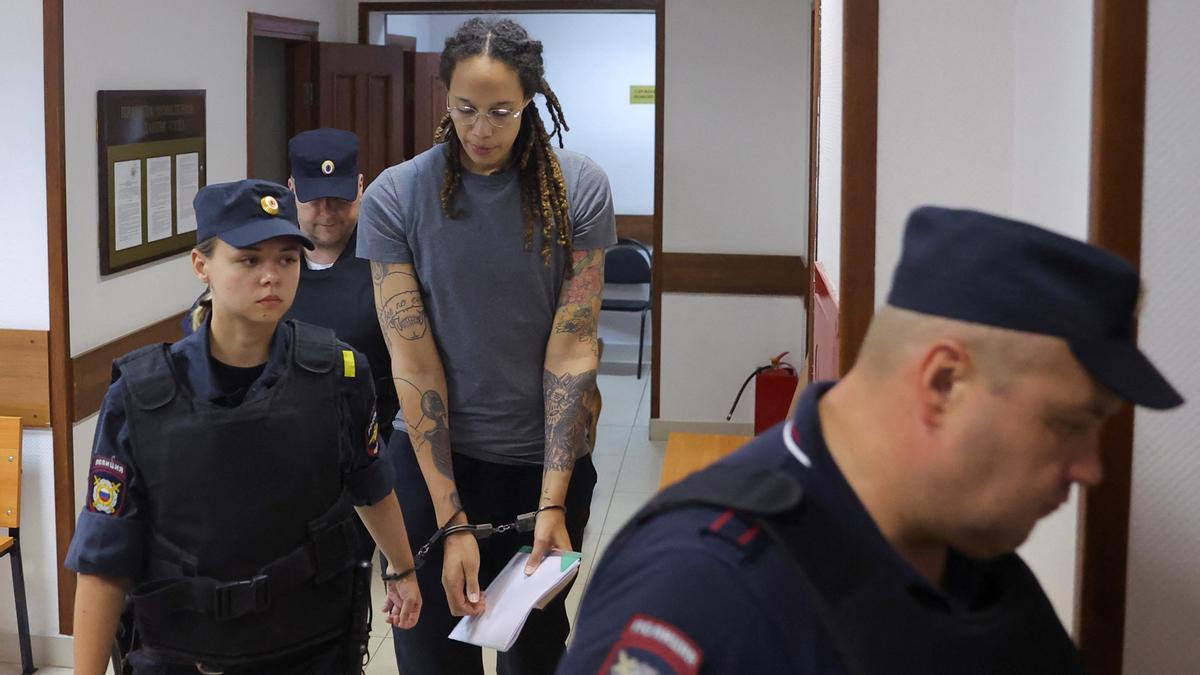 Court hearing of U.S. basketball player Brittney Griner U.S. basketball player Brittney Griner, who was detained at Moscow's Sheremetyevo airport and later charged with illegal possession of cannabis, is escorted after the court's verdict in Khimki outside Moscow, Russia August 4, 2022. REUTERS/Evgenia Novozhenina