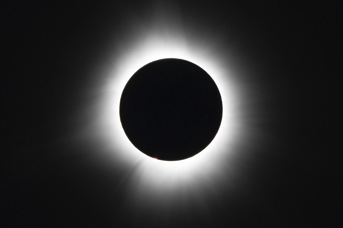 The moon covers the sun during a total solar eclipse, as seen from Bishops University in Sherbrooke, Quebec, Monday, April 8, 2024. (AP Photo/Mark Schiefelbein)