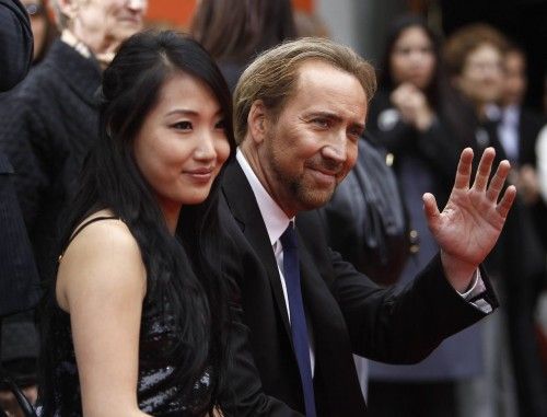 File photo of Cage and his wife Kim attending the hand and footprints ceremony for producer Jerry Bruckheimer at the Grauman's Chinese theatre in Hollywood