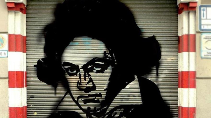 Grafiti con el rostro de Beethoven en la puerta de una garaje. | |