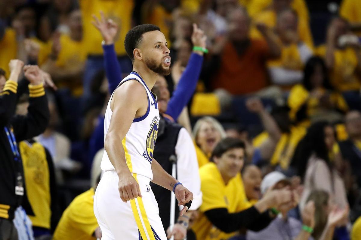 OAKLAND, CALIFORNIA - MAY 14: Stephen Curry #30 of the Golden State Warriors reacts to a shot during the second half against the Portland Trail Blazers in game one of the NBA Western Conference Finals at ORACLE Arena on May 14, 2019 in Oakland, California. NOTE TO USER: User expressly acknowledges and agrees that, by downloading and or using this photograph, User is consenting to the terms and conditions of the Getty Images License Agreement.   Ezra Shaw/Getty Images/AFP