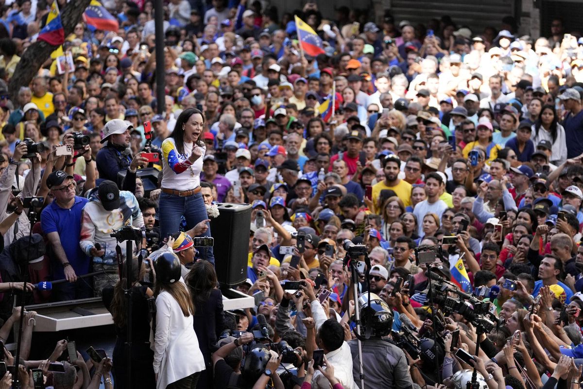 Opposition leader Maria Corina Machado addresses supporters during a protest against Venezuelan President Nicolas Maduro the day before his inauguration for a third term in Caracas, Venezuela, Thursday, Jan. 9, 2025. (AP Photo/Matias Delacroix)