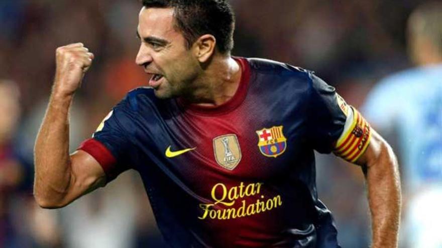 Xavi celebra un gol con el Barça