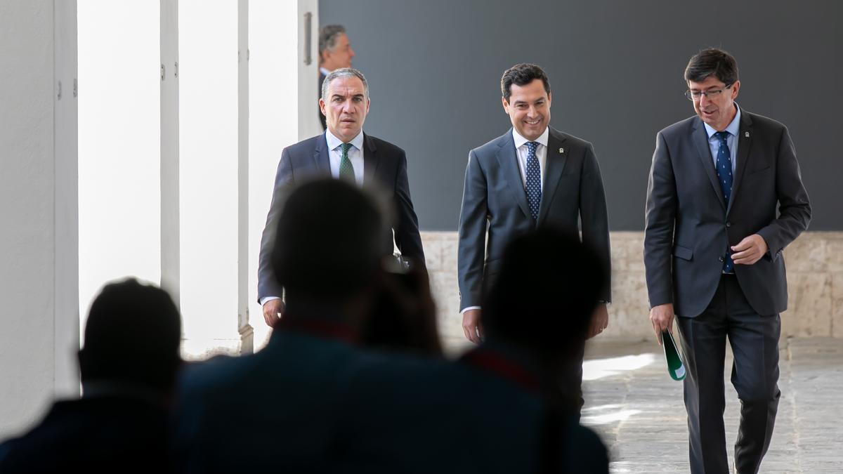 Juanma Moreno, Elías Bendodo y Juan Marín.