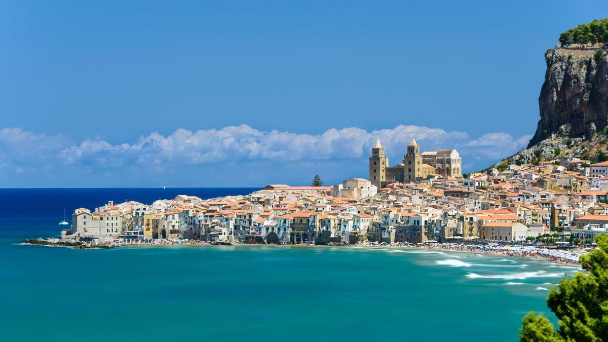 View of Cefalù with beach and castle