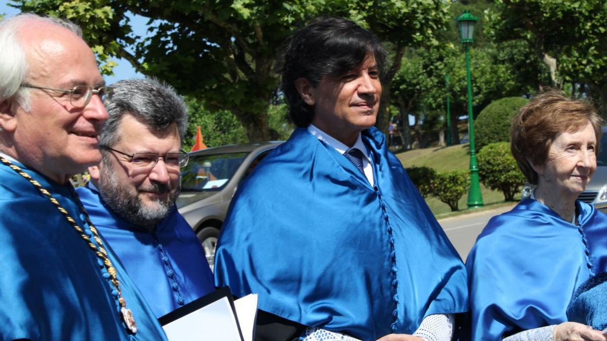 Por la izquierda, Santos González, Efim Zelmanov, Carlos López Otín y Margarita Salas, cuando Zelmanov y Otín fueron nombrados Honoris Causa por la Universidad Menéndez Pelayo.