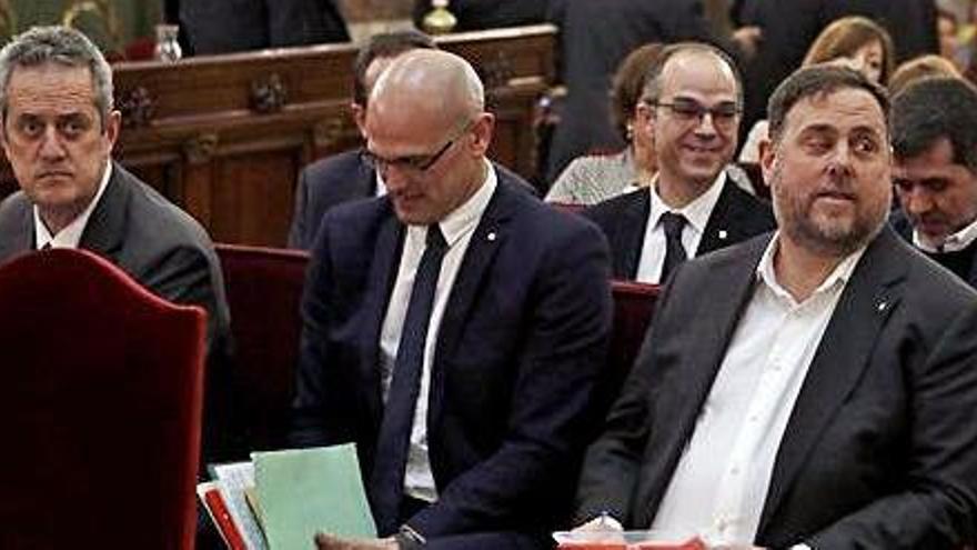 Joaquim Forn, Raül Romeva i Oriol Junqueras, en la primera sessió del judici