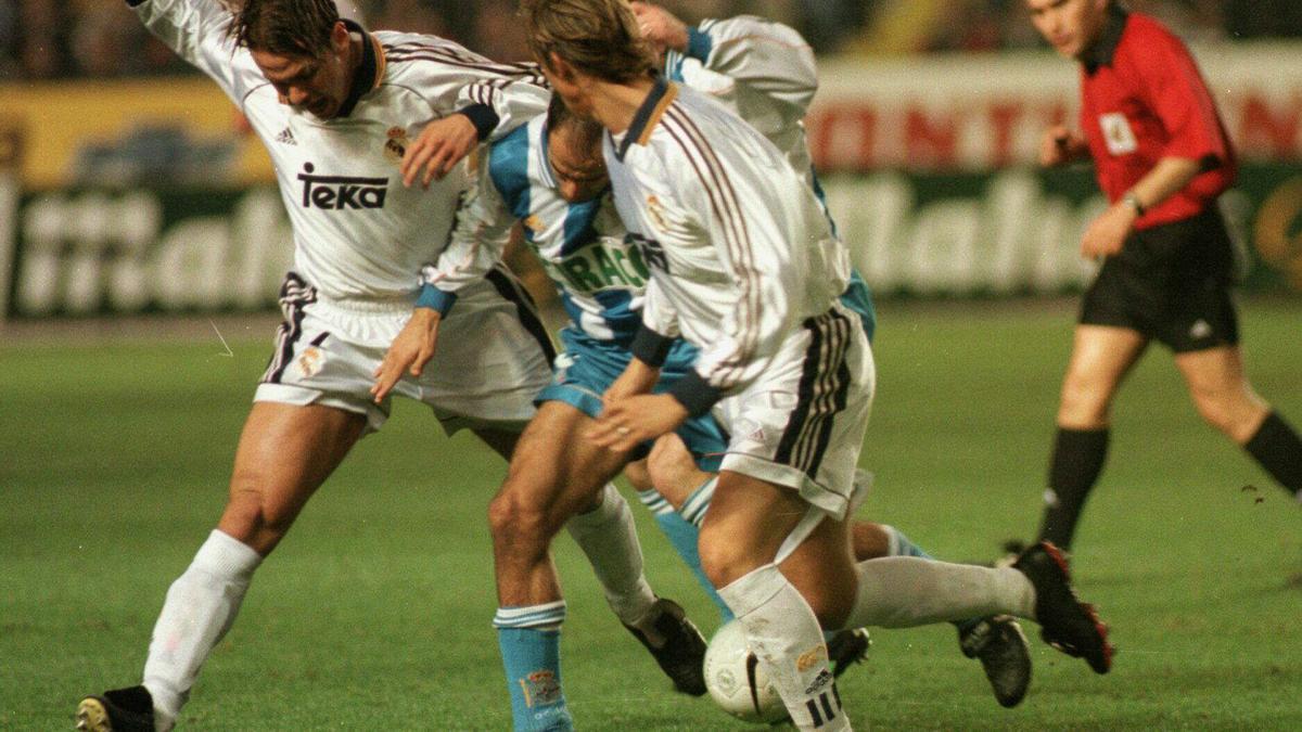 Manuel Pablo entre Redondo y Guti