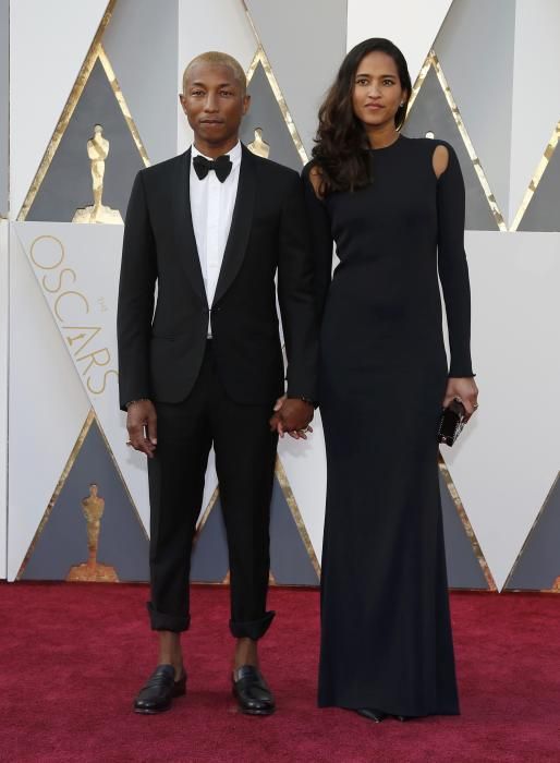 Singer Pharrell Williams and wife Helen ...