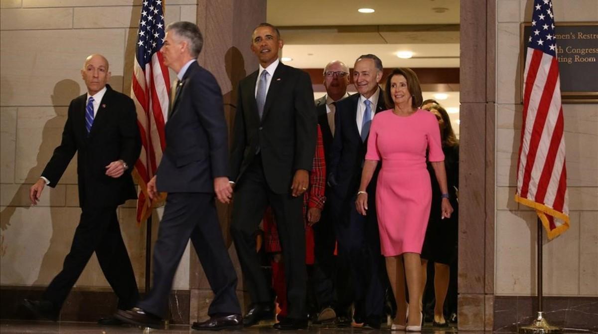 undefined36761548 u s  president barack obama arrives for a meeting with democ170104211026