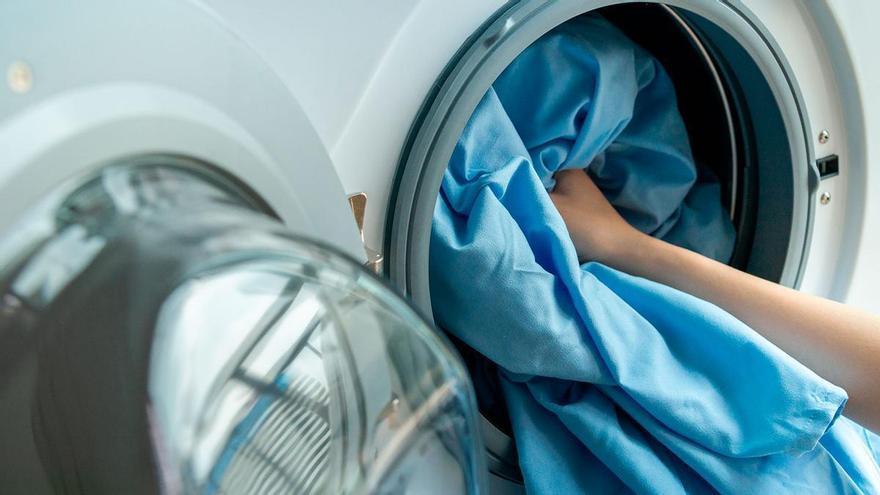El botón secreto de la lavadora que seca la ropa