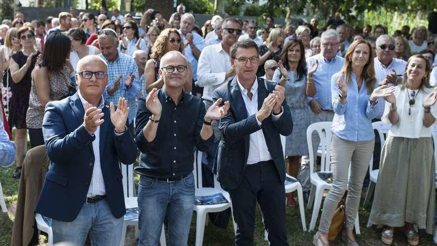 Baltar, Jesús Vázquez y Núñez Feijóo, en primer plano, ayer, en Ourense. // Brais Lorenzo