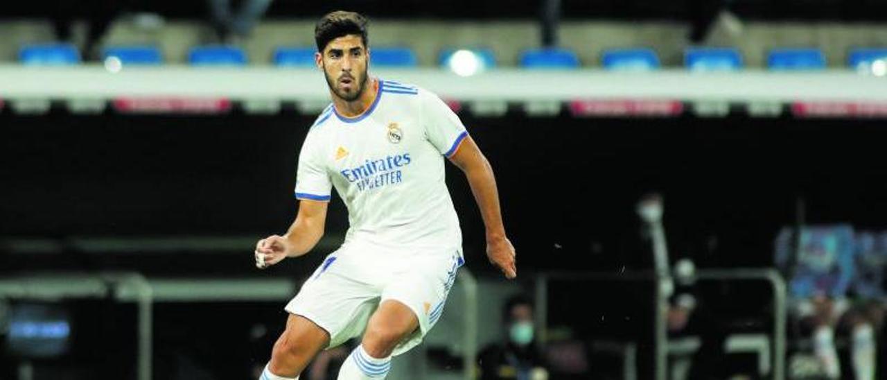 Marco Asensio controla un balón durante el partido del 
miércoles ante el Mallorca. |  E. PRESS