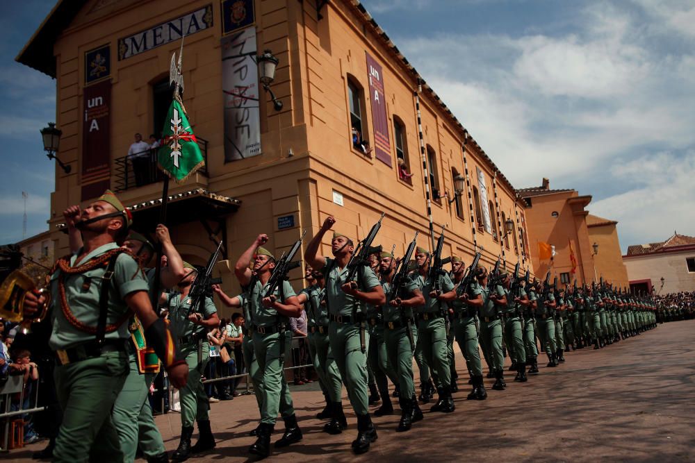 Spanish legionnaires march along a street during ...