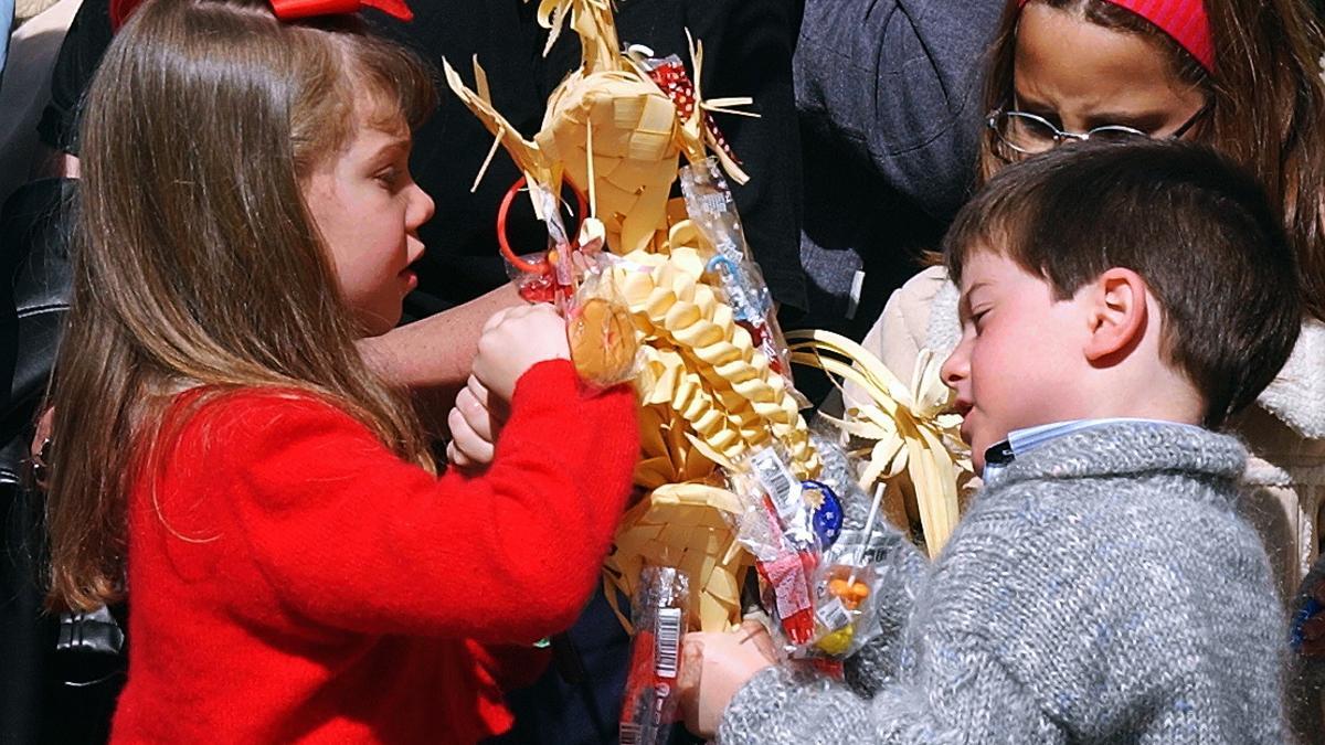 Niños con Palmas.