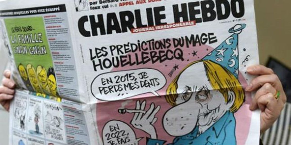 Un lector, amb el número de la revista ’Charlie Hebdo’. Un lector, amb el número de la revista ’Charlie Hebdo’.