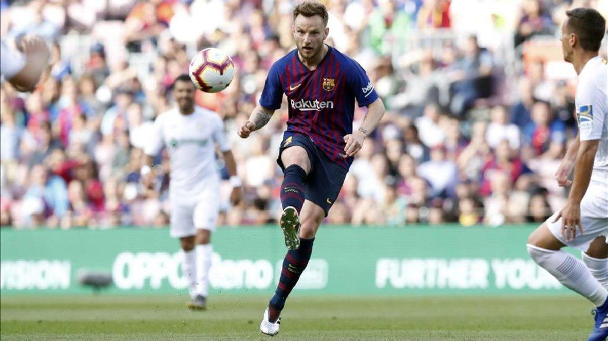 Rakitic, en un partido con el Barça