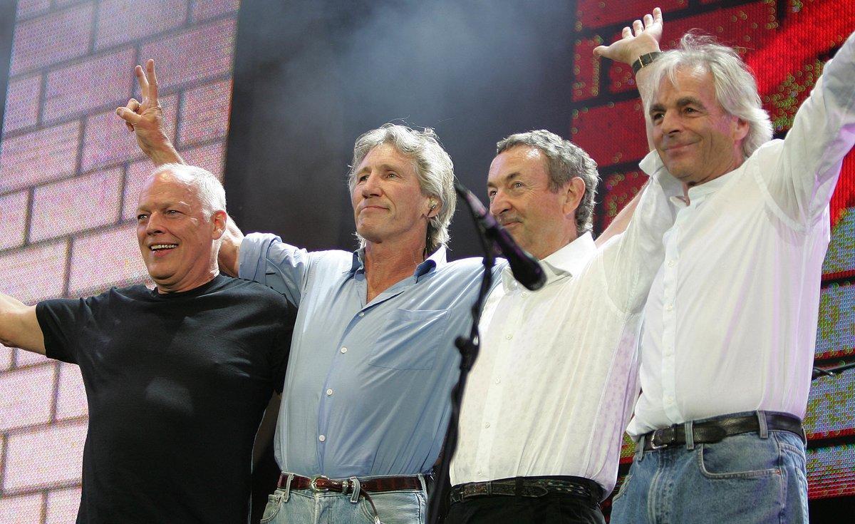 (L to R) British rock stars, Dave Gilmour, Roger Waters, Nick Mason and Rick Wright of Pink Floyd, perform at the Live 8 concert in Hyde Park in London July 2, 2005. A galaxy of rock and roll stars will grace stages across the globe on Saturday for what is being billed as the greatest music show ever, in a bid to put pressure on leaders of the Group of Eight major industrialised nations meeting in Scotland next week to do more to alleviate poverty, particularly in Africa. Live 8, an expanded version of the Live Aid sensation 20 years ago, will take in 10 cities and four continents, kicking off in Tokyo in the east and ending in North America in the west. REUTERS/Stephen Hird