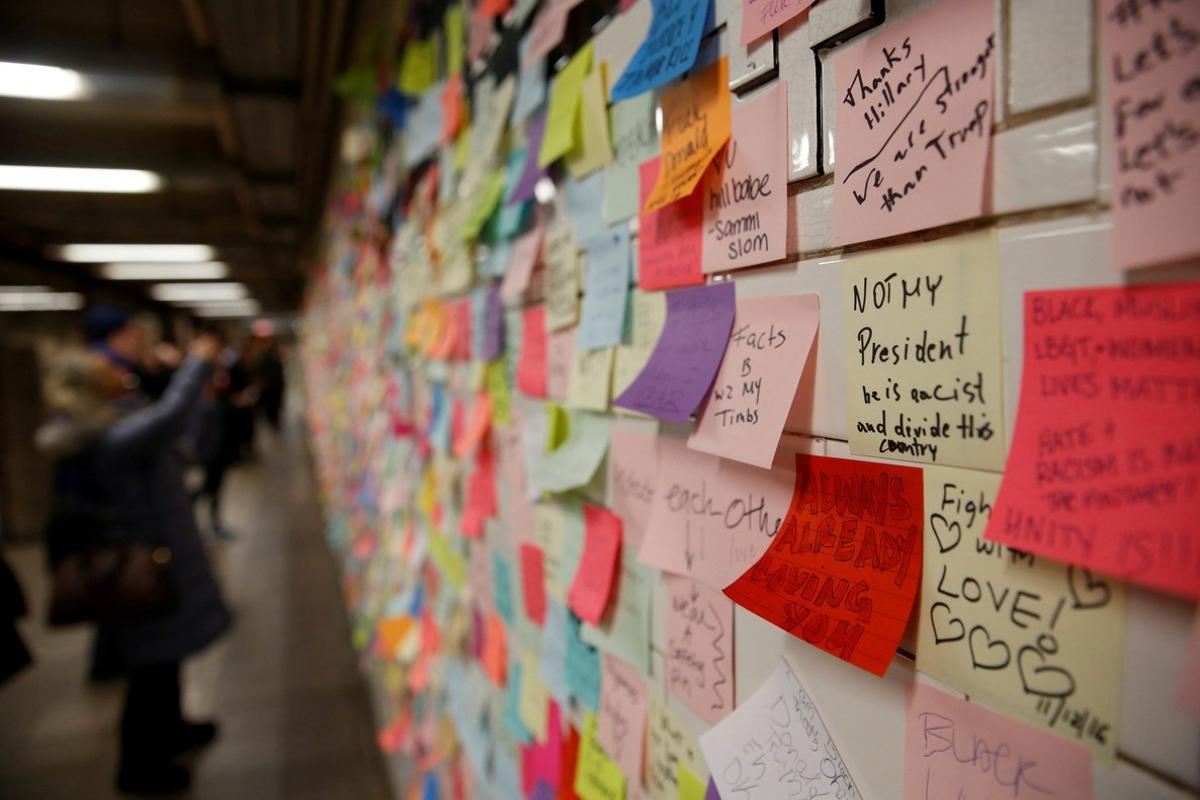 Post-election Post-it notes are seen pasted along a tiled walk at Union Square subway station in New York U S   November 14  2016  REUTERS Shannon Stapleton File Photo