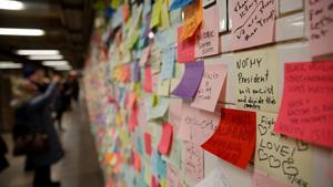 Post-election Post-it notes are seen pasted along a tiled walk at Union Square subway station in New York U S   November 14  2016  REUTERS Shannon Stapleton File Photo