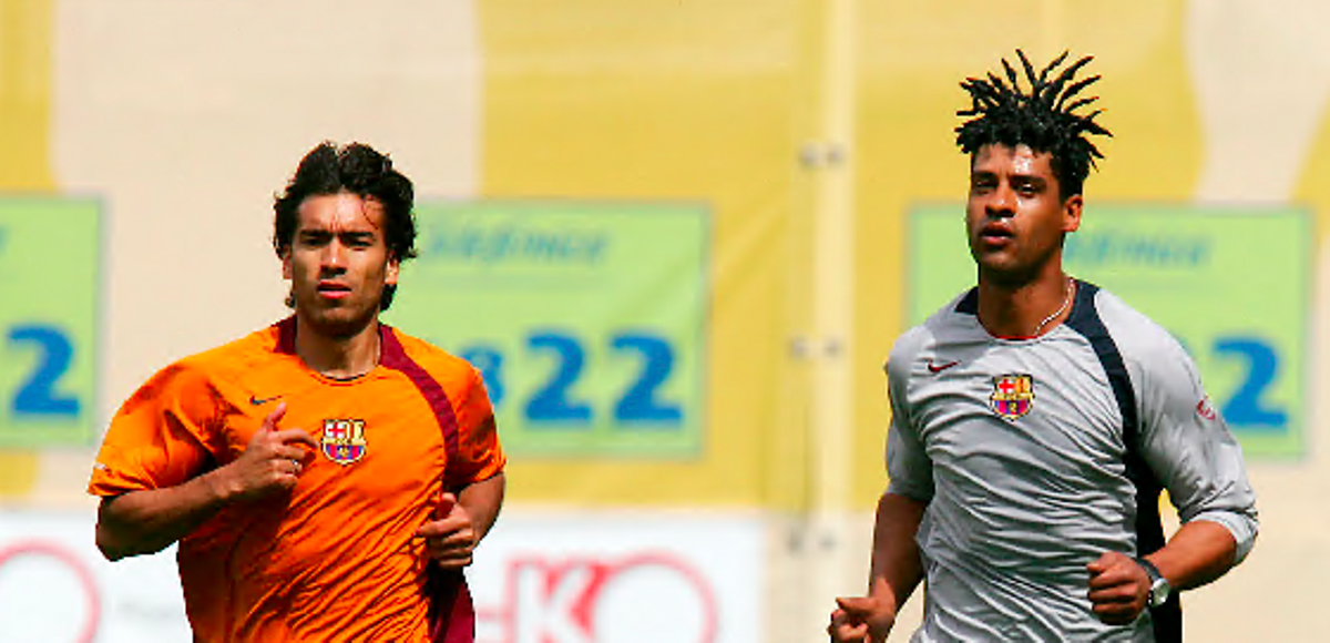 Van Bronckhorst junto a Rijkaard.