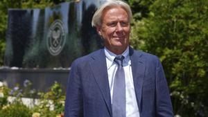 FILE - Tennis great Bjorn Borg poses for a photo as he arrives for Day 11 at the Wimbledon Tennis Championships in London, July 10, 2025. (AP Photo/Joanna Chan, File)