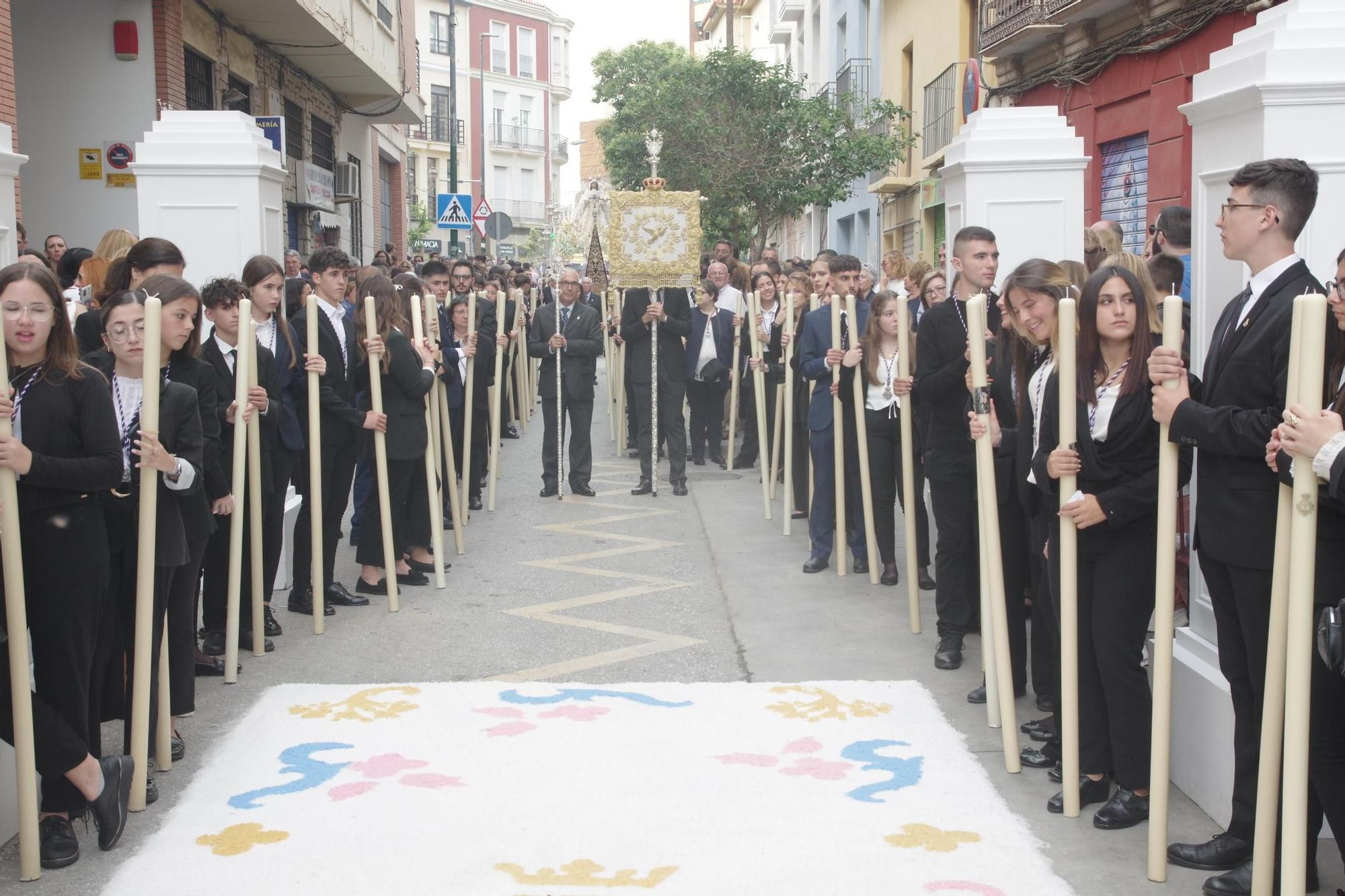 La procesión de la Virgen del Rocío por la Victoria y Lagunillas, en imágenes