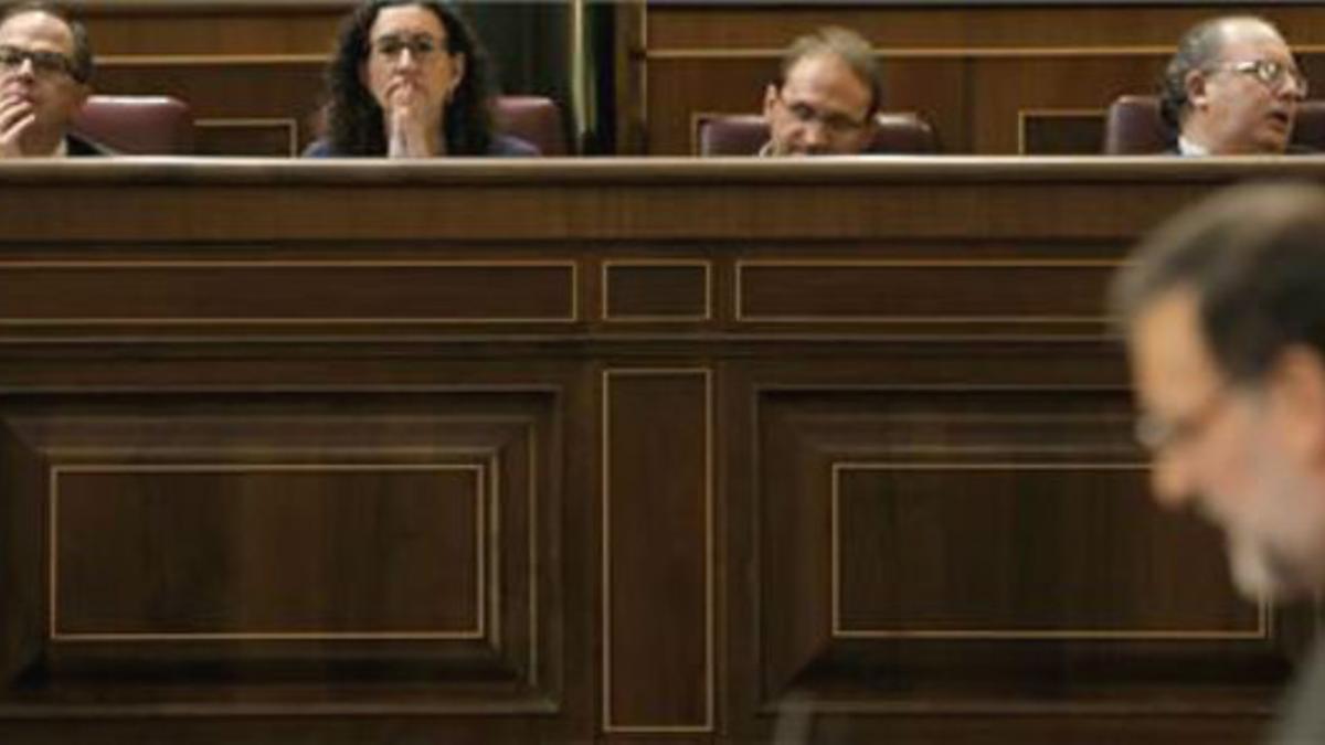 Turull, Rovira y Herrera en la sesión del congreso