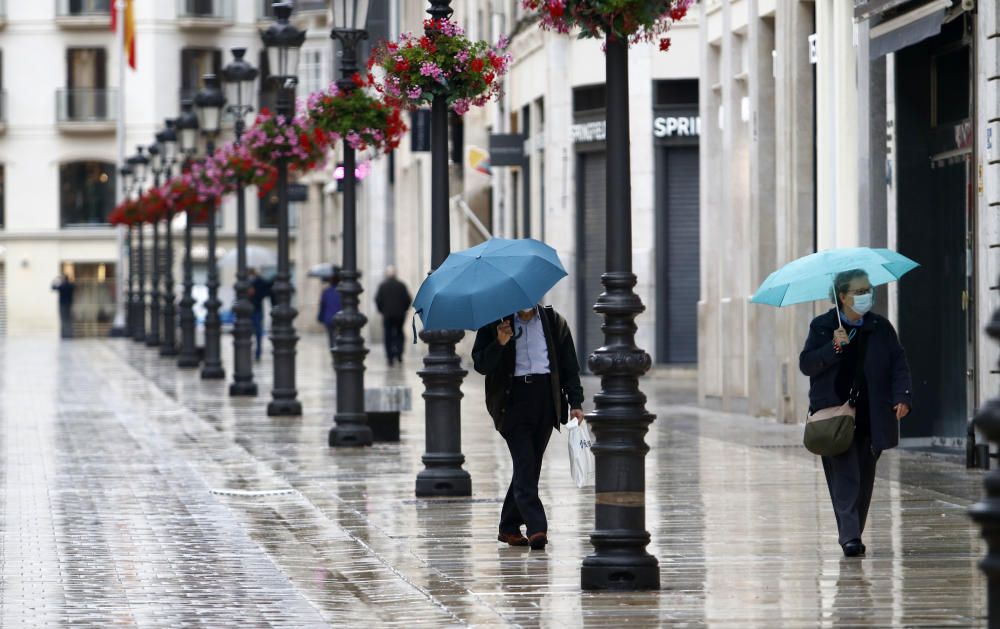 Jornada pasada por agua en la capital, sobre todo durante la mañana, mientras los ciudadanos viven las que podrían ser sus últimas jornadas en la fase 0 de la desescalada.