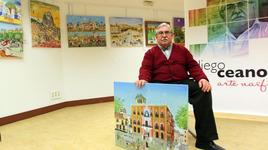 Diego Ceano, en un rincón de la exposición, con una de sus obras: la plaza del Obispo.