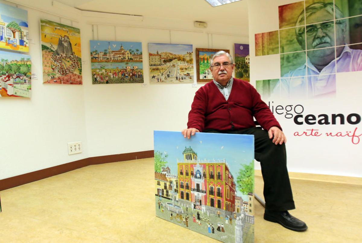 Diego Ceano, en un rincón de la exposición, con una de sus obras: la plaza del Obispo.