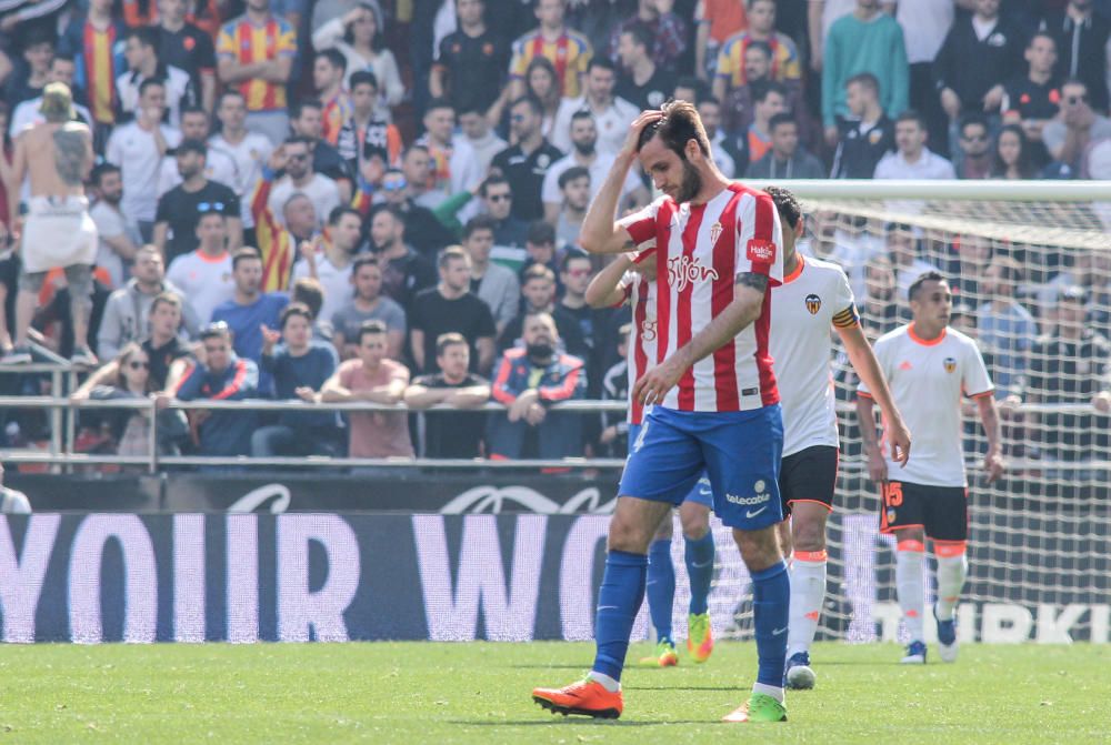 El partido entre el Valencia y el Sporting, en imágenes