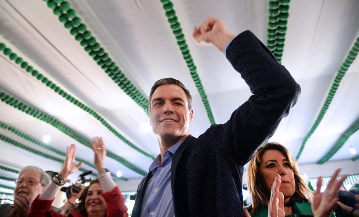 undefined47720161 spanish prime minister pedro sanchez winks as he raises his 190411193830