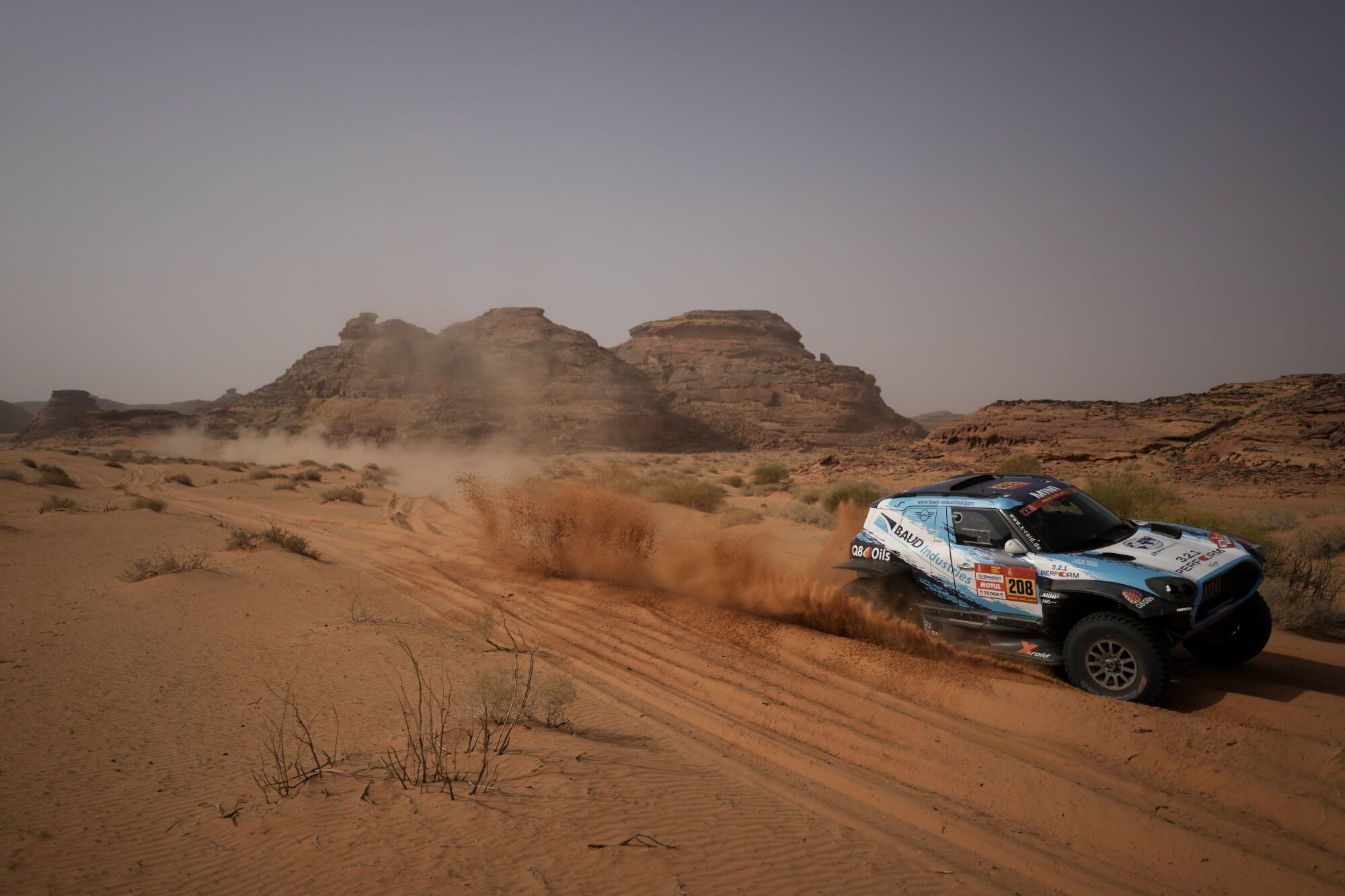 Driver Lionel Baud and co-driver Lucie Baud compete during the third stage of the Dakar Rally with a start and finish in Alula, Saudi Arabia, Tuesday, Jan. 6, 2026. (AP Photo/Thibault Camus)