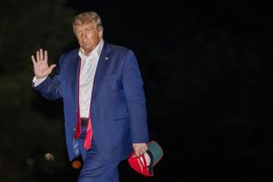 President Donald Trump walks on the South Lawn of the White House in Washington, early Sunday, June 21, 2020, after stepping off Marine One as he returns from a campaign rally in Tulsa, Okla. (AP Photo/Patrick Semansky)