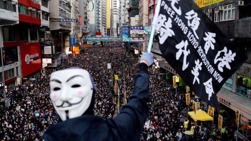 Una gran marcha pacífica recorre Hong Kong pidiendo reformas democráticas