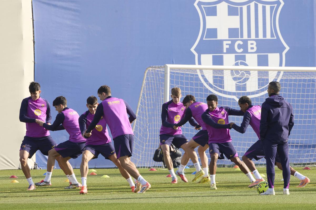 Imagen del calentamiento de la sesión de este viernes del Barça.