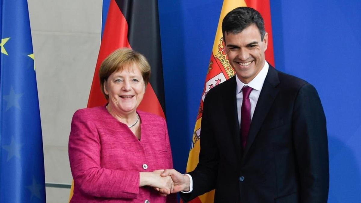 Pedro Sánchez y Angela Merkel tras su encuentro en Berlín, el pasado 26 de junio.