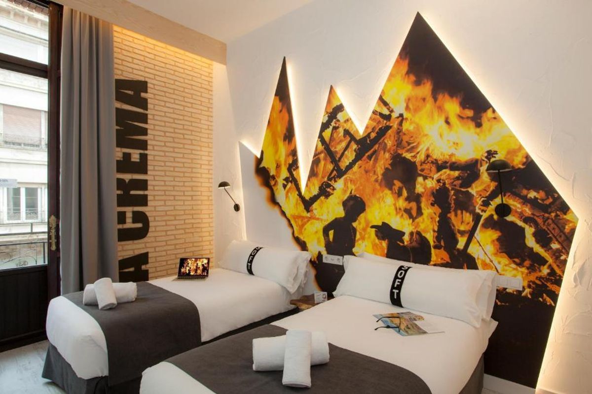 Imagen de una habitación del hotel Casual Socarrat de València.