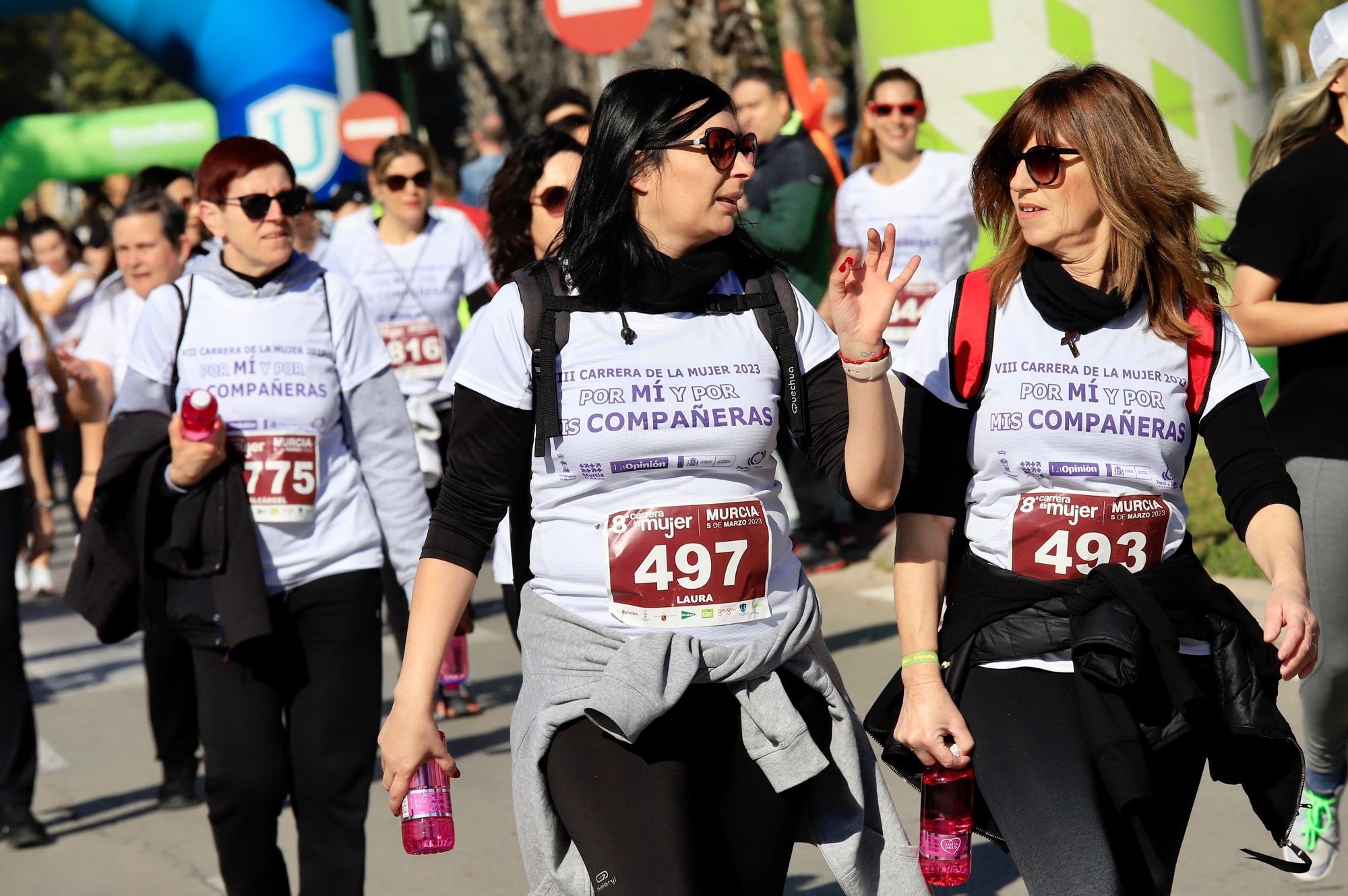 La salida y el recorrido de la Carrera de la Mujer 'inmortalizados' en imágenes