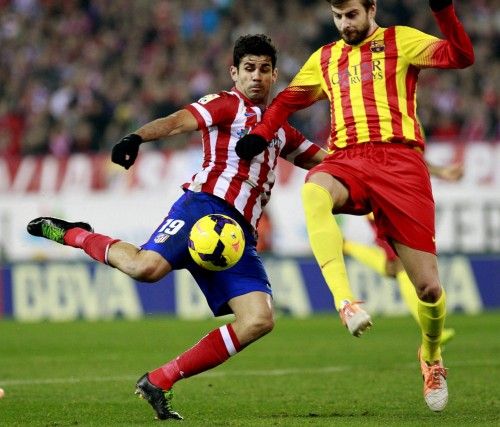 Imágenes del partido disputado entre el Atlético y el Barça.