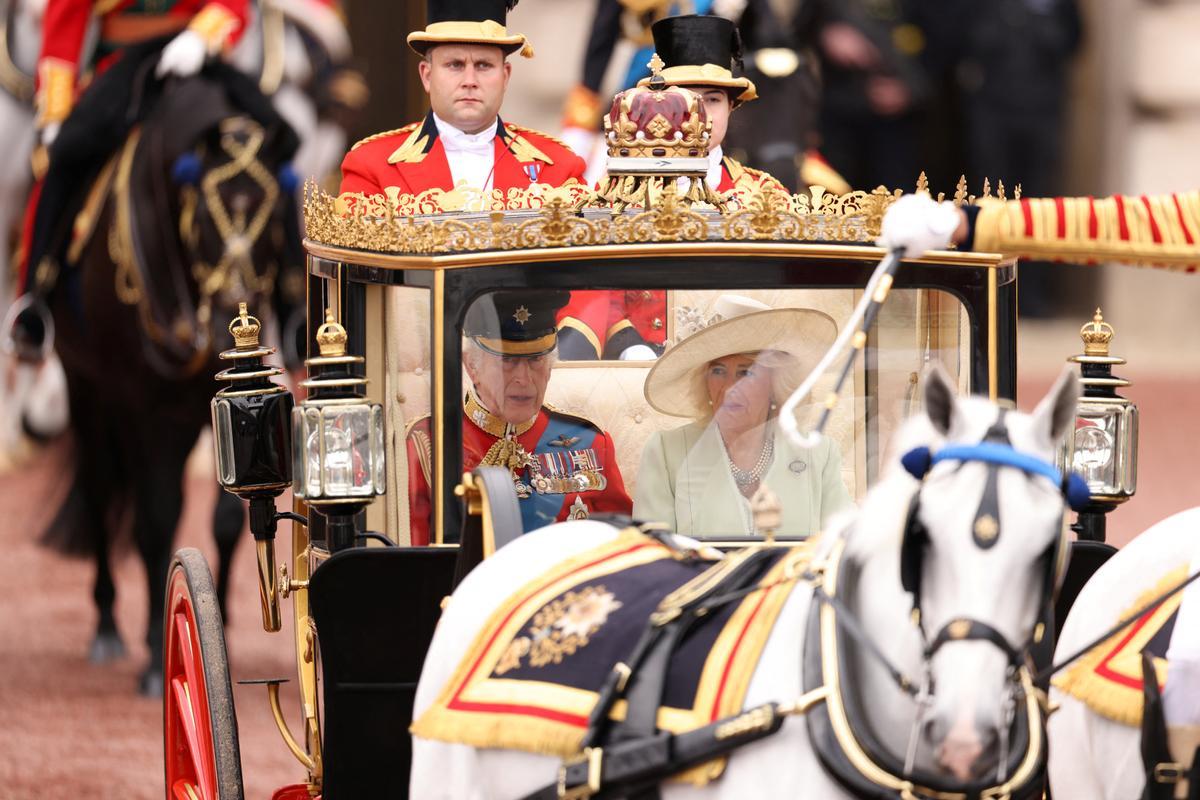 Britains King Charles and Queen Camilla attend the Trooping the Colour parade to honour him on his official birthday in London, Britain, June 15, 2024. REUTERS/Hollie Adams
