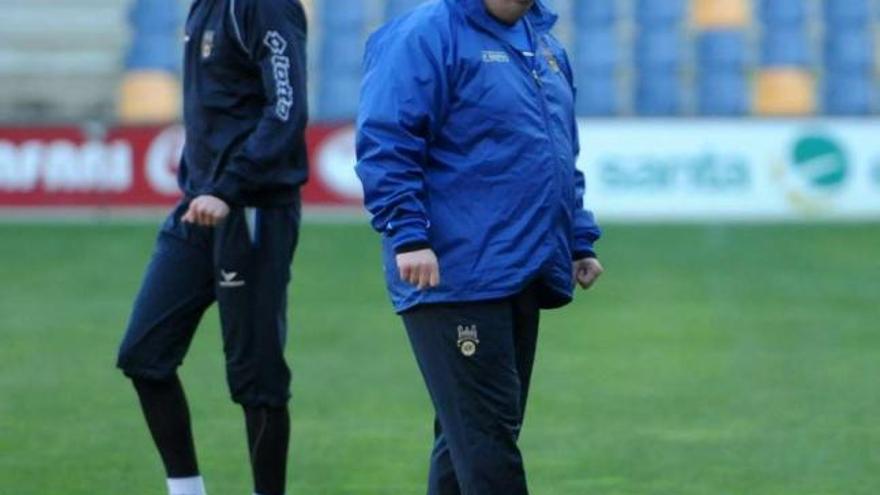 El portero Lorenzo y Milo Abelleira, durante una sesión de entrenamiento en Pasarón. // Gustavo Santos