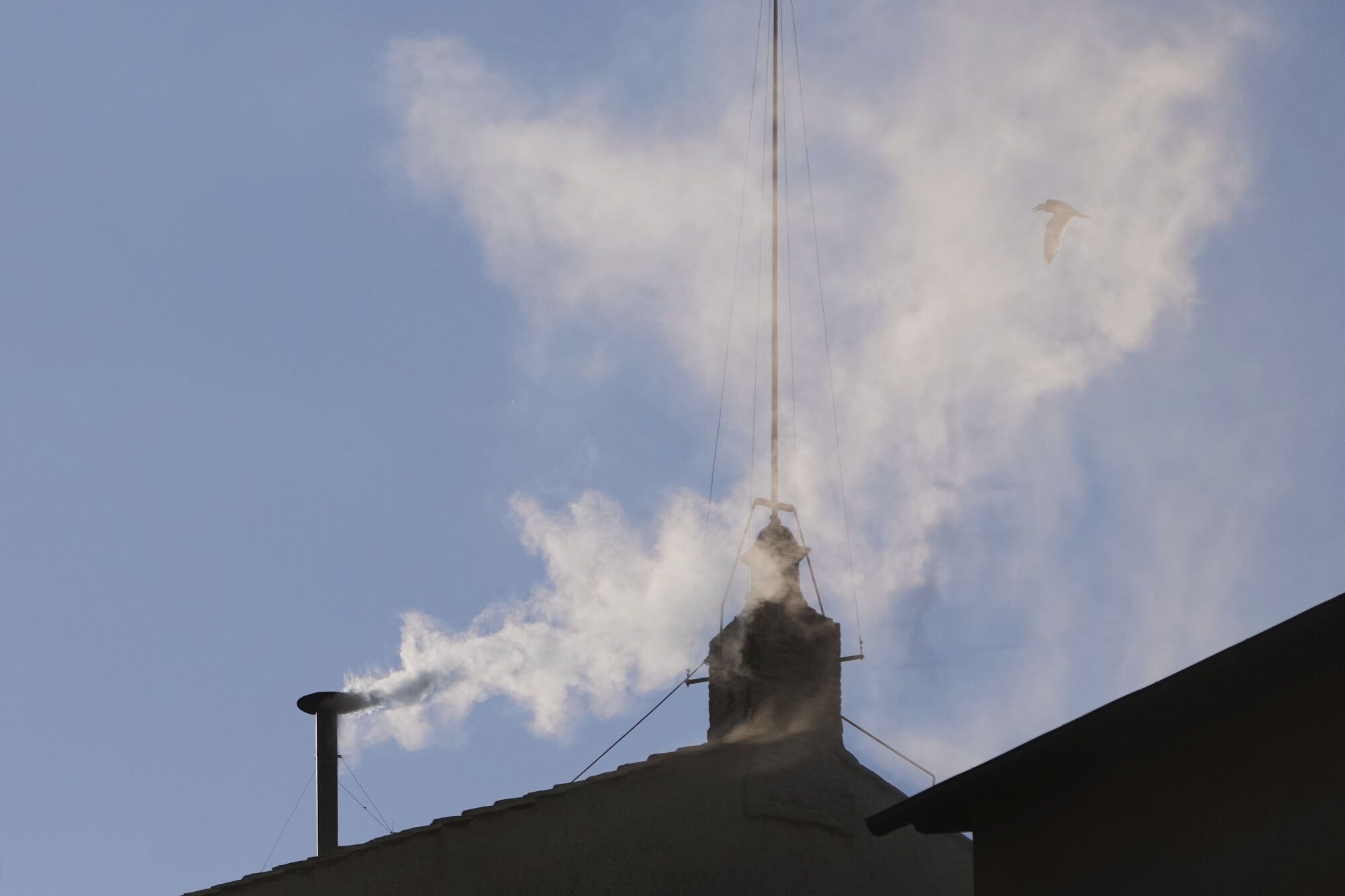 White smoke billows from the chimney of the Sistine Chapel where 133 cardinals are gathering on the second day of the conclave to elect a successor to late Pope Francis, at the Vatican, Thursday, May 8, 2025 (AP Photo/Alessandra Tarantino)
