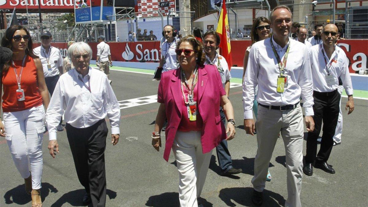 Bernie Ecclestone, con la malograda Rita Barberá y Alberto Fabra, en Valencia